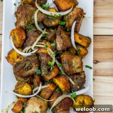 Square image of fried pork and plantains.
