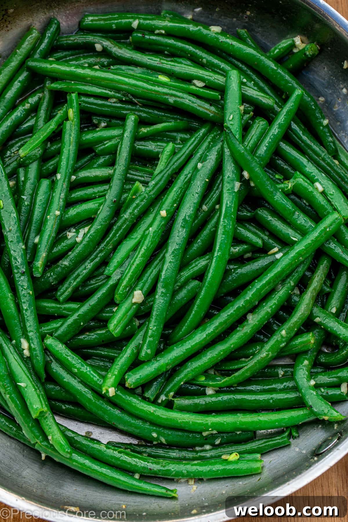 Garlic Butter Green Beans Recipe with Crispy Garlic 2 Skillet of garlic butter green beans.