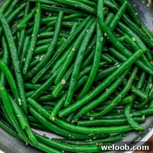 Garlic Butter Green Beans Recipe with Crispy Garlic 16 Square image of green beans.