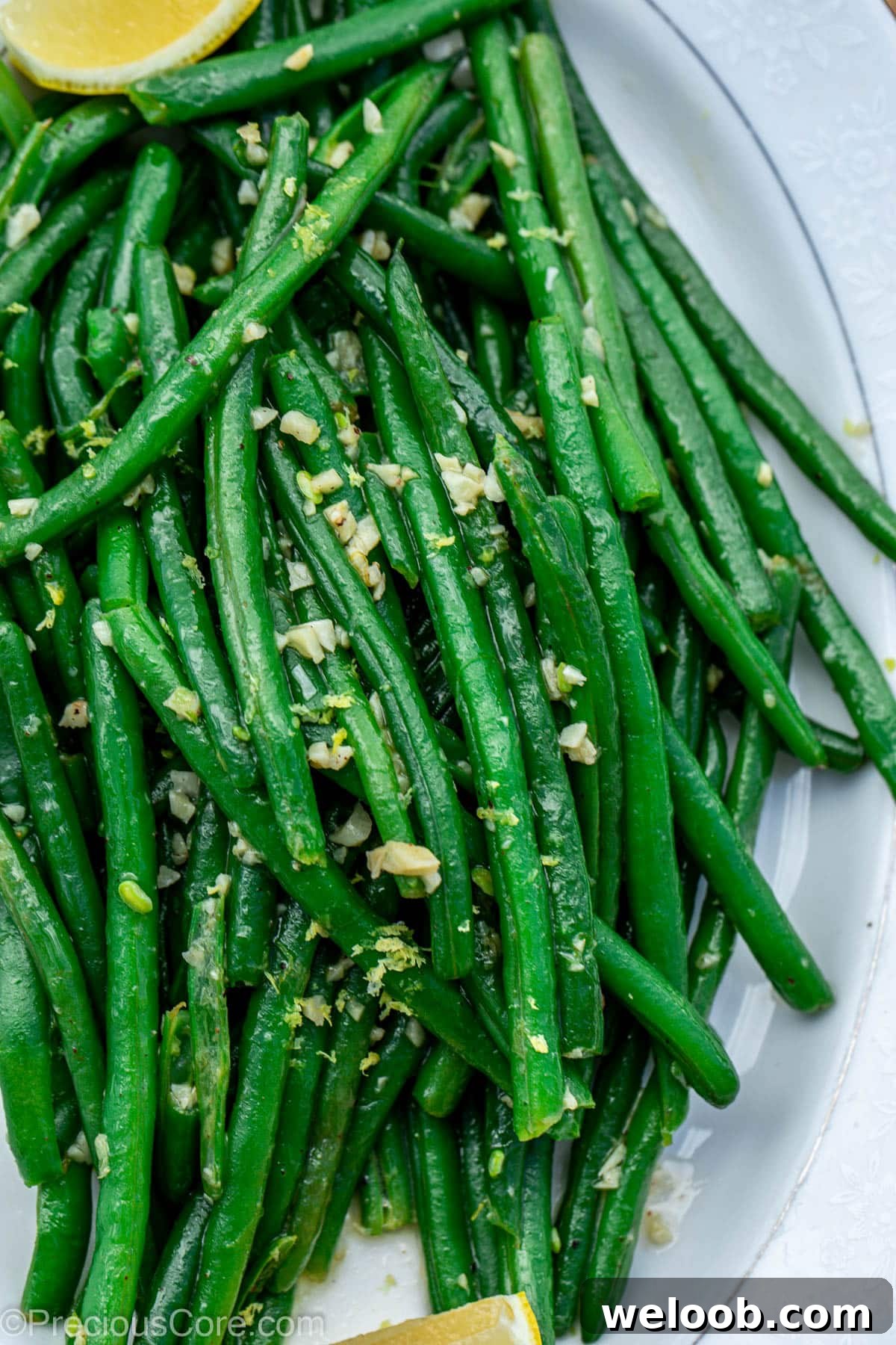 Garlic Butter Green Beans Recipe with Crispy Garlic 3 Cooked green beans on a serving tray.