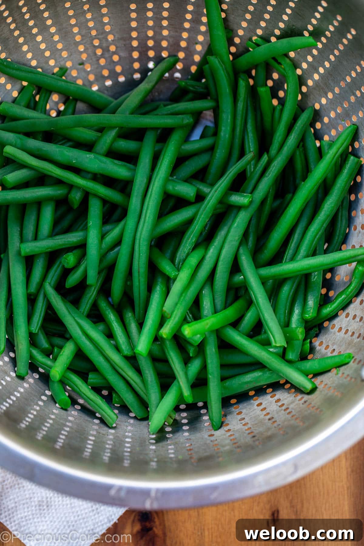 Garlic Butter Green Beans Recipe with Crispy Garlic 7 Runner beans in a colander