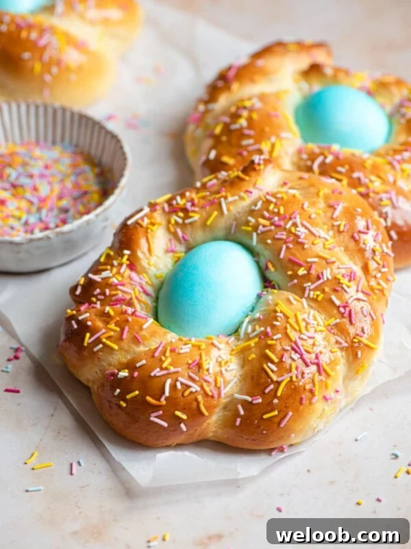 Italian Easter bread with a blue egg in the middle covered with sprinkles