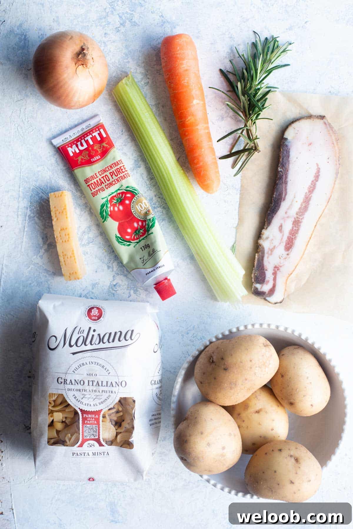 An overhead shot of all the ingredients you need to make Pasta e Patate.