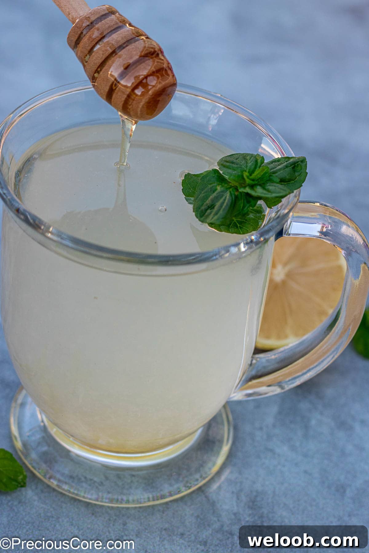 A mug of honey lemon tea.