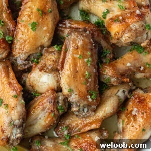 Garlic Butter Wings in a white dish.