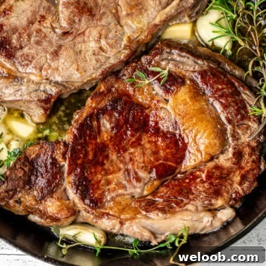 Pan-Seared Lemon Butter Salmon with Garlic and Herbs 20 Square image of pan seared ribeye steaks.