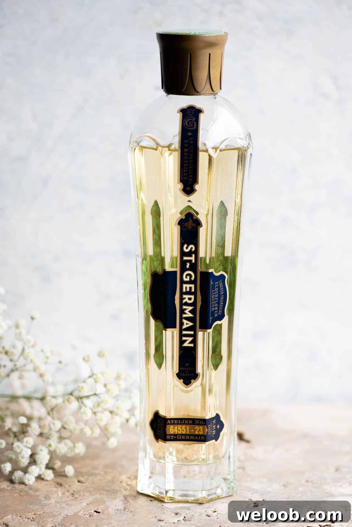 A close up of a bottle of St Germain elderflower liqueur.