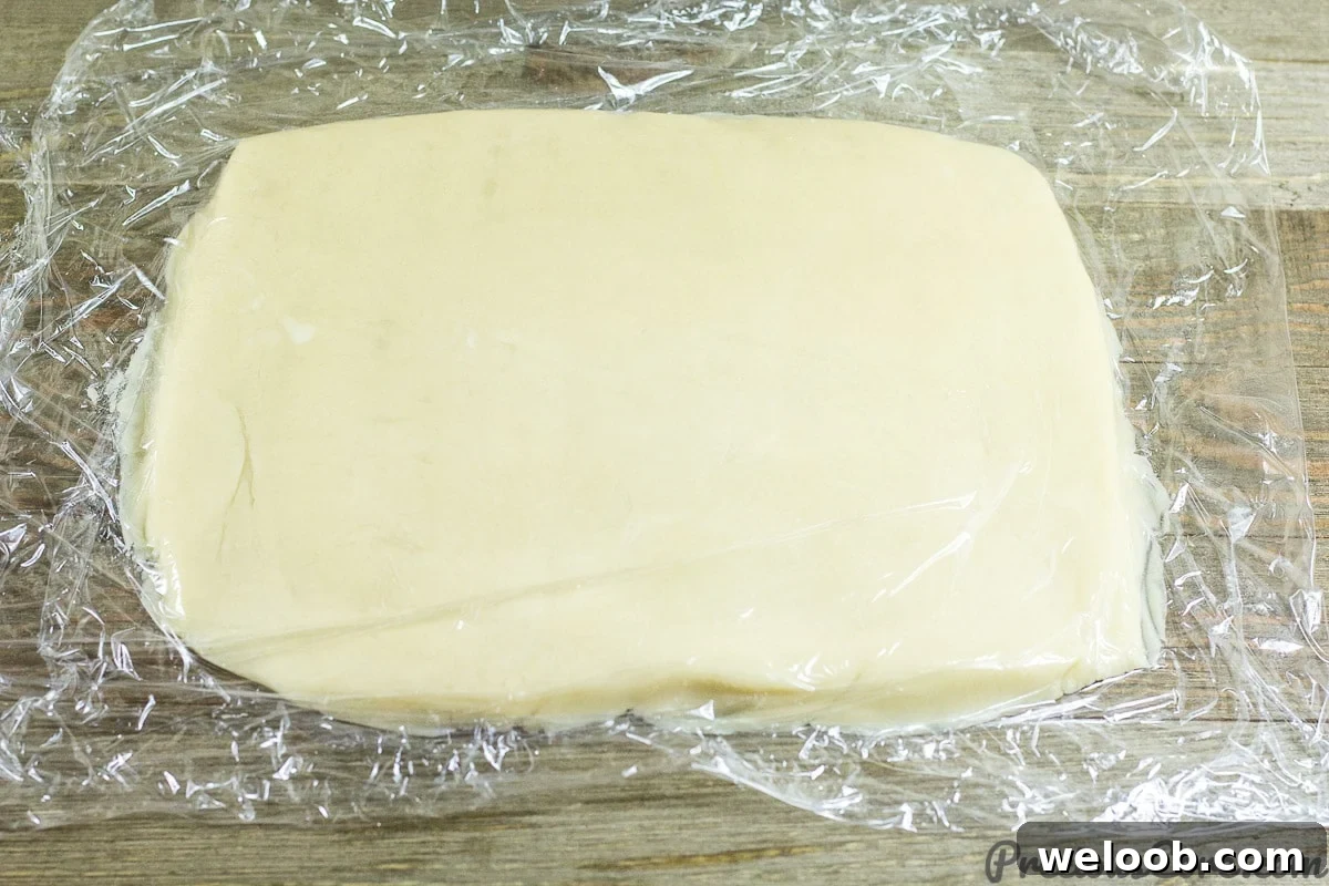 Rolling out dough for homemade shortbread cookies.