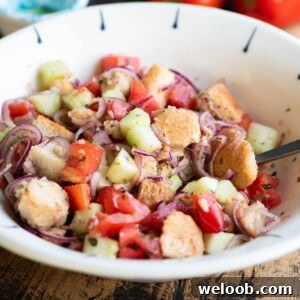 A close up cropped image of a Cialledda salad in a bowl.