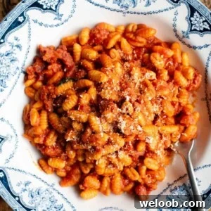 A close up cropped image of Malloreddus alla Capidanese (Sardinian Ragu).