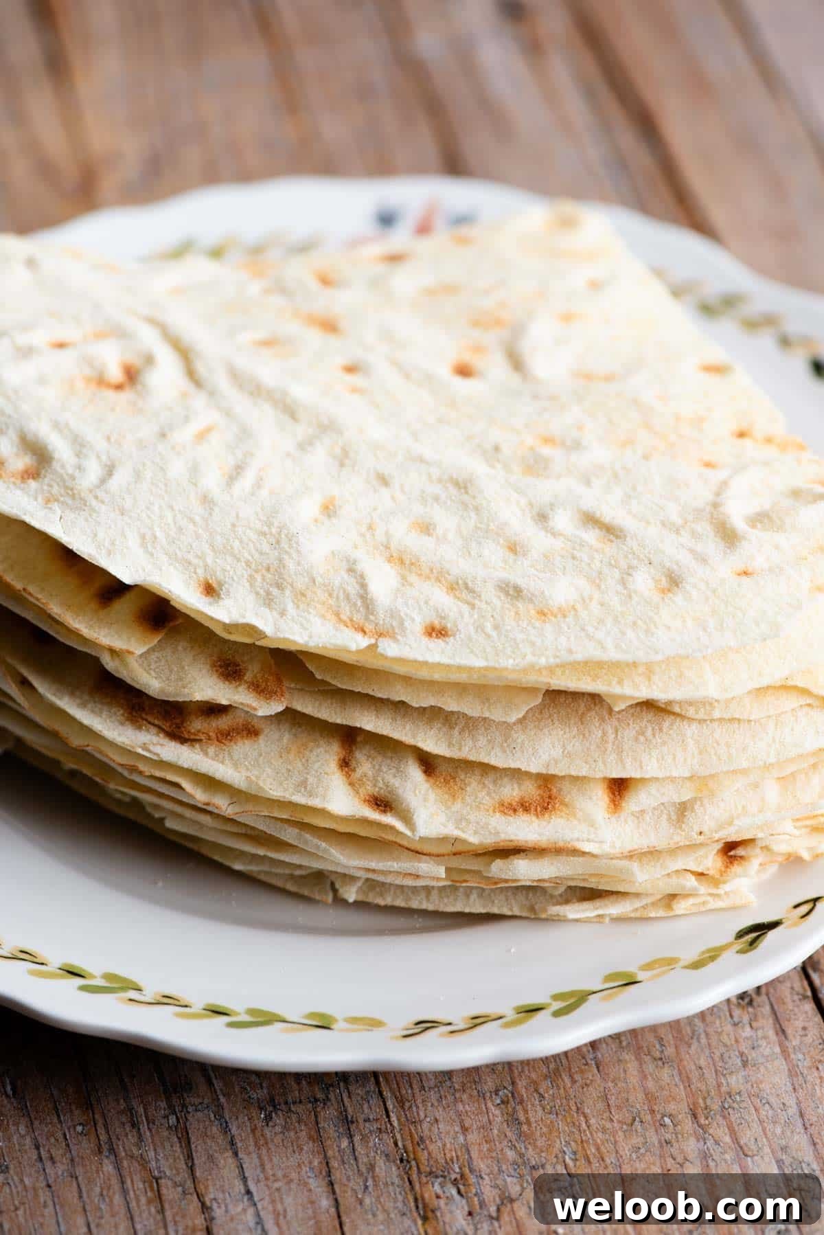 A close up of Pane Carasau piled high on. aplate.