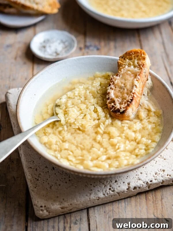 Pastina soup in a rustic bowl