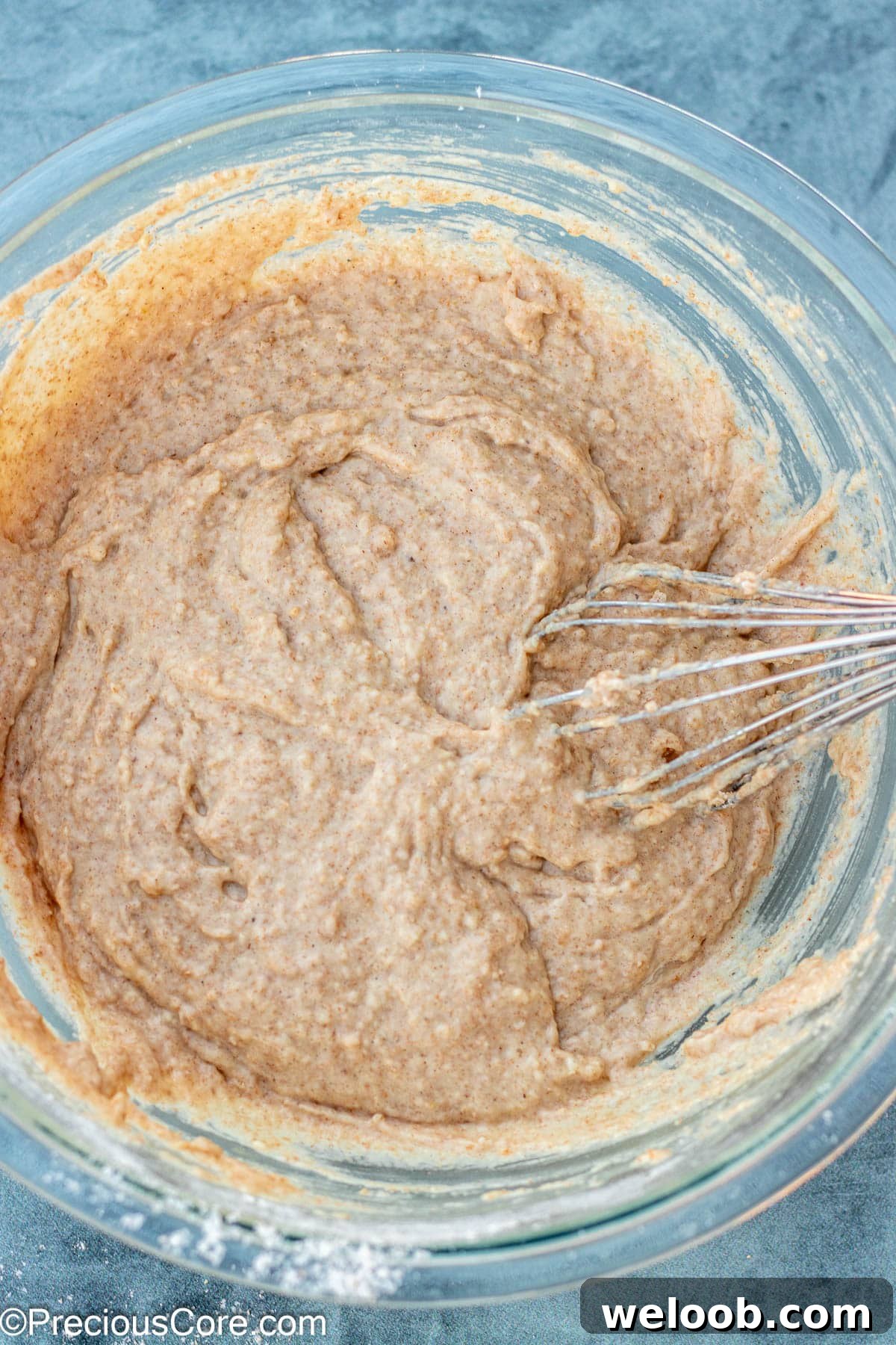 Wet ingredients for muffins whisked together.