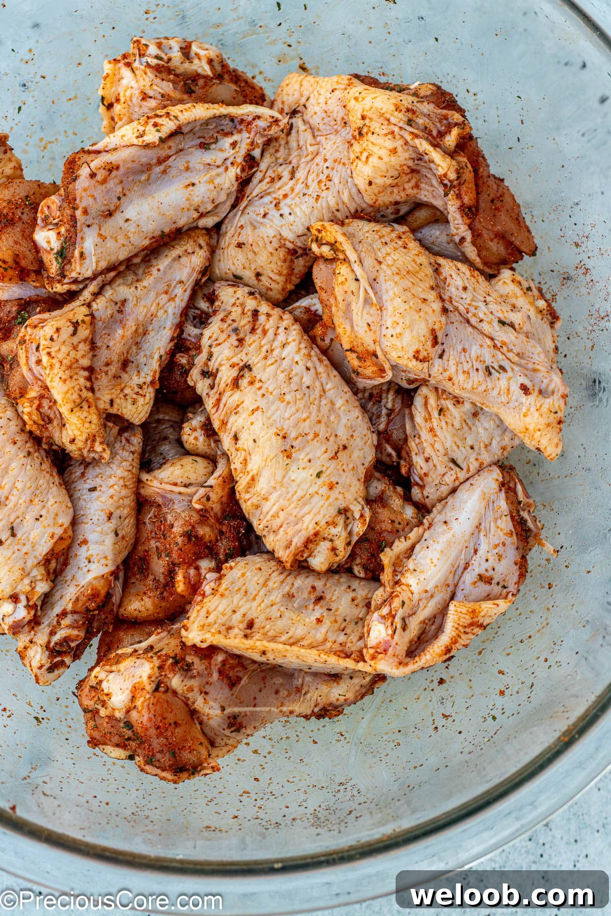 Seasoned chicken in a bowl.
