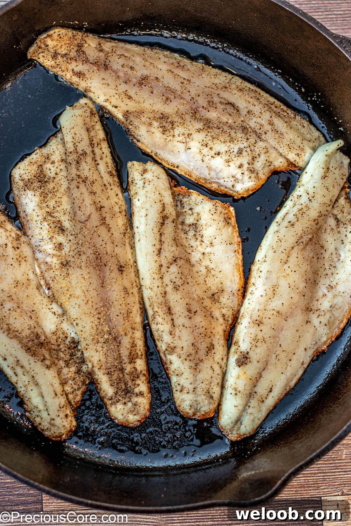 Fish filets in 12 inch cast iron skillet.