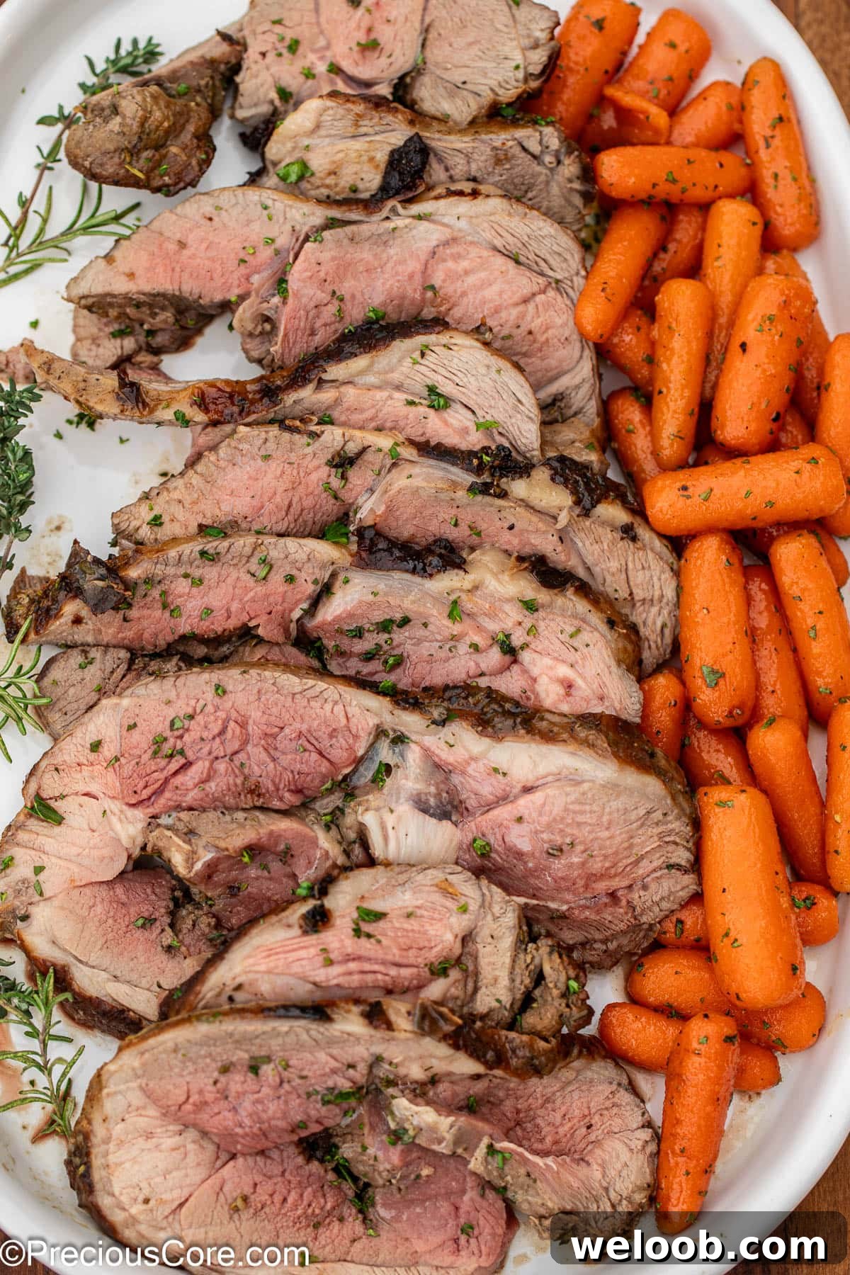 Tasty lamb on a serving platter with glazed carrots.