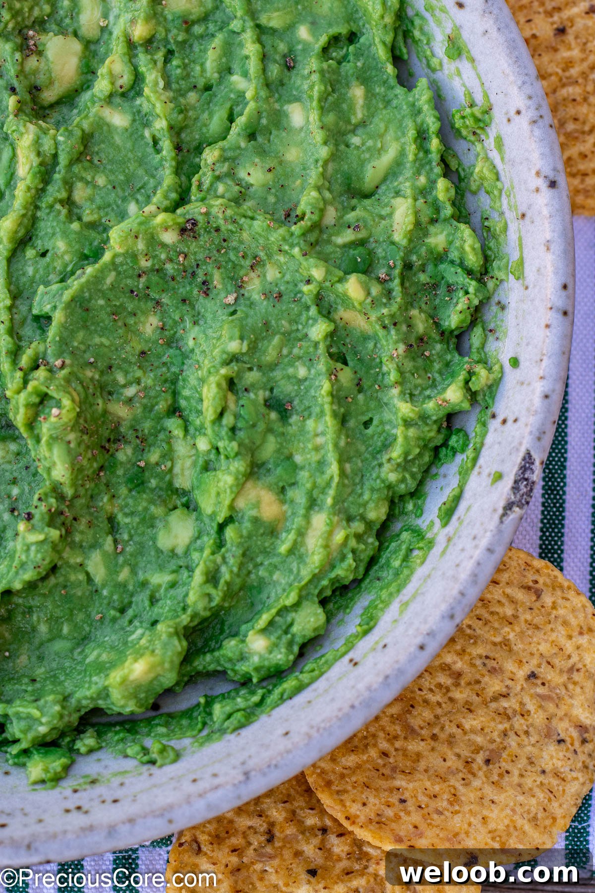 4 ingredient guacamole recipe, served with tortilla chips.