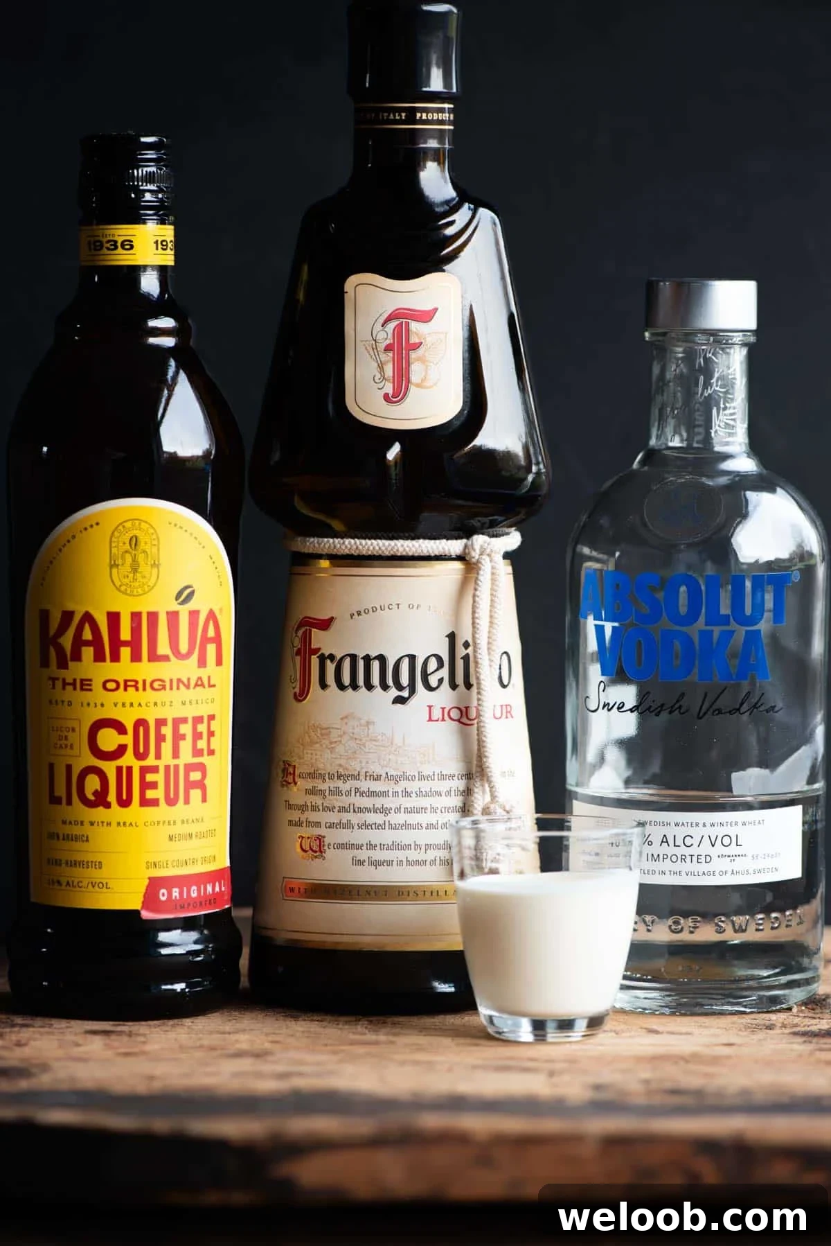 A side shot of all the ingredients you need to make a Frangelico White Russian.