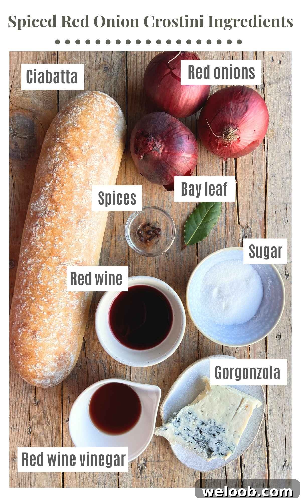 An overhead shot of all the ingredients needed to make red onion and gorgonzola crostini.