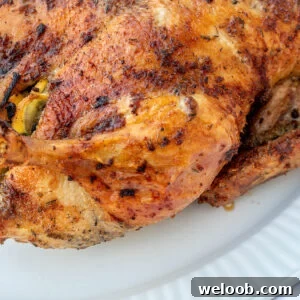 Herb Roasted Duck on a white serving tray.