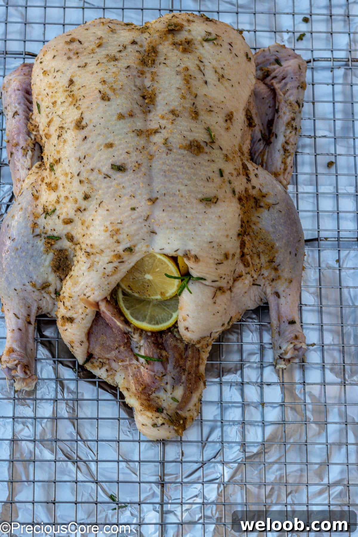 Whole duck seasoned with herbs and spices.