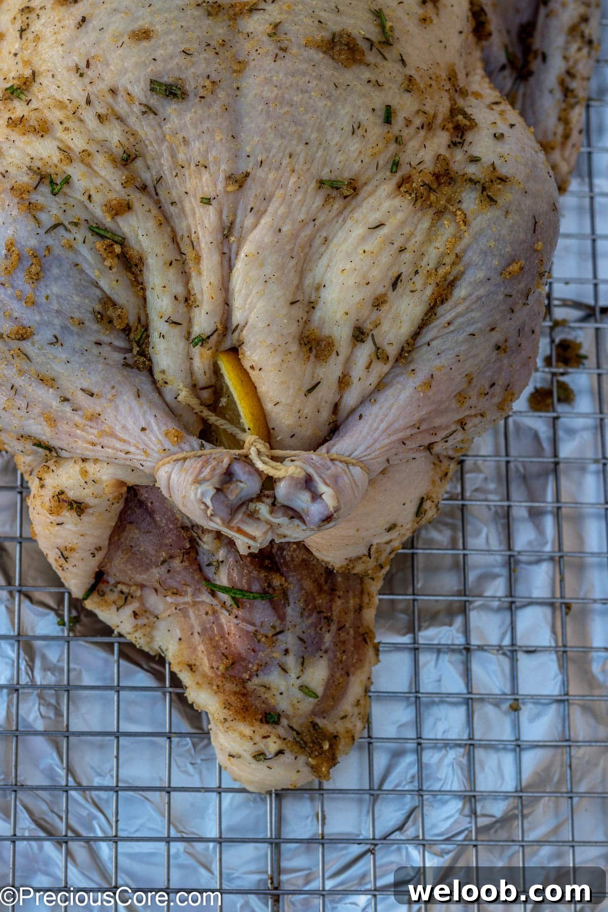 Duck legs tied with butcher twine.