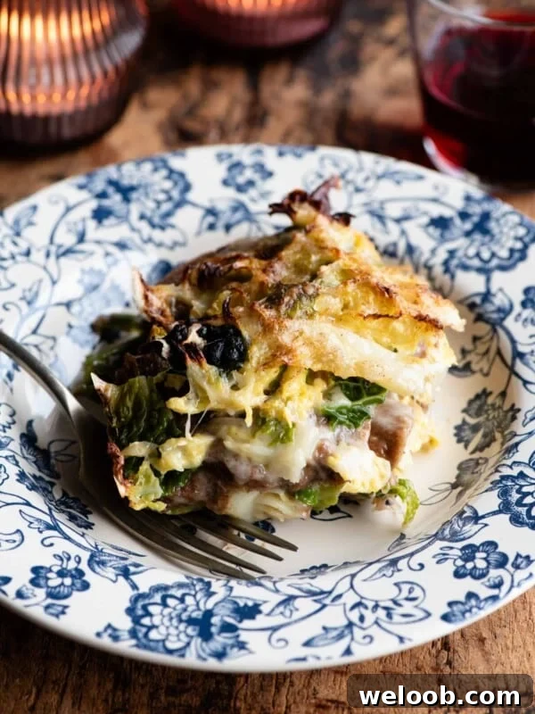 A slice of a rustic Italian casserole on a blue plate.
