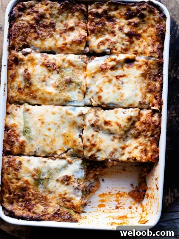 An overhead shot of Lasagna Bolognese in a large baking dish.