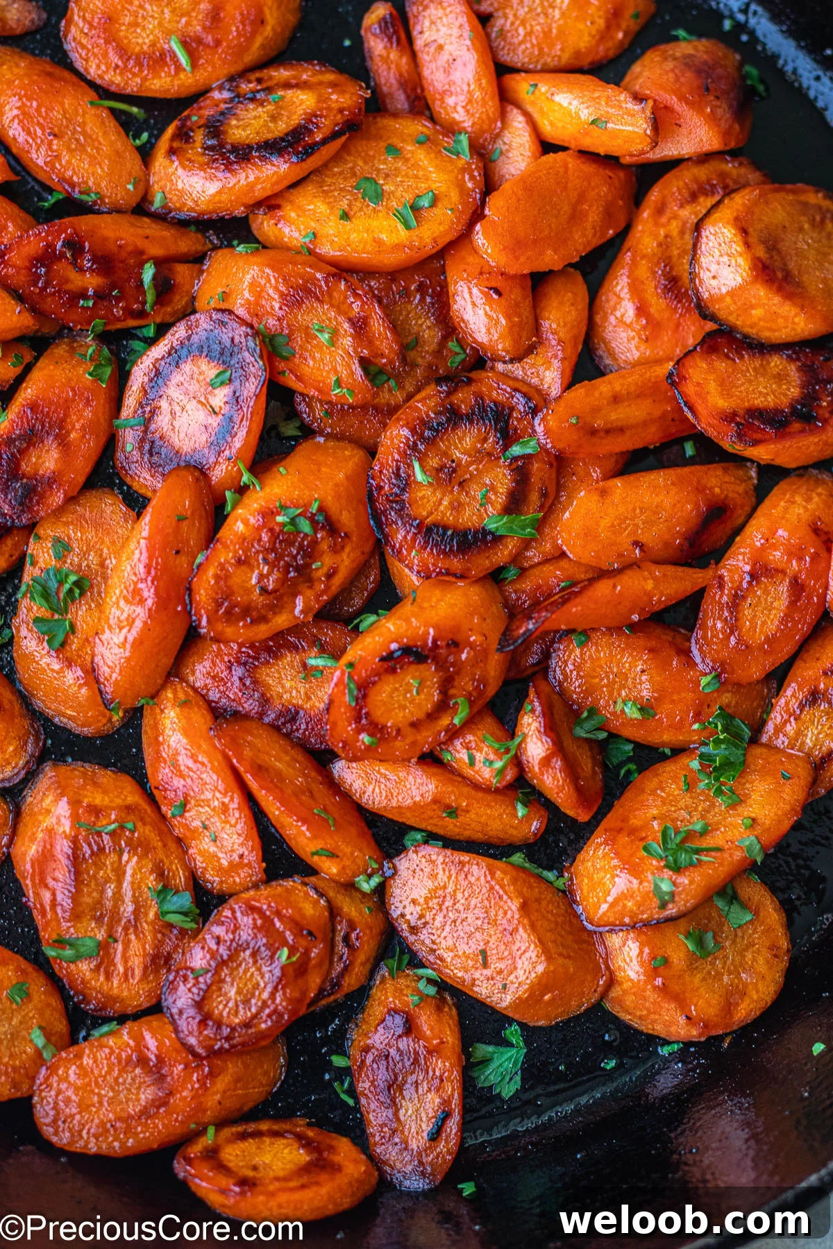 Fried Carrots in a cast iron skillet.
