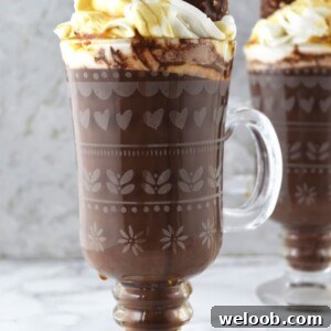Let this Baileys Hot Chocolate with Maple Whipped Cream bring you comfort and joy this holiday season - Indulgent, delicious and simple!