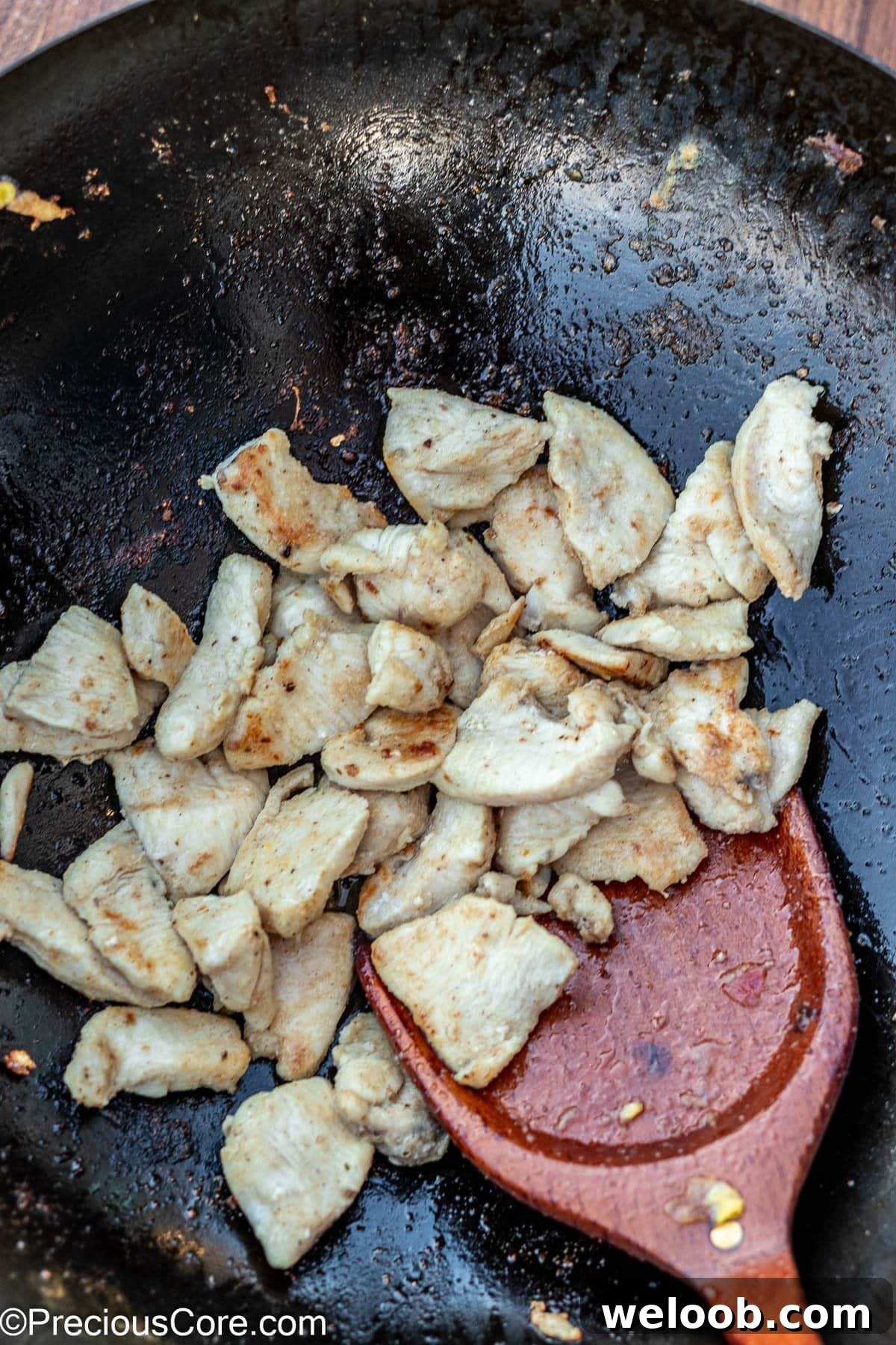 Cooked chicken in a wok.