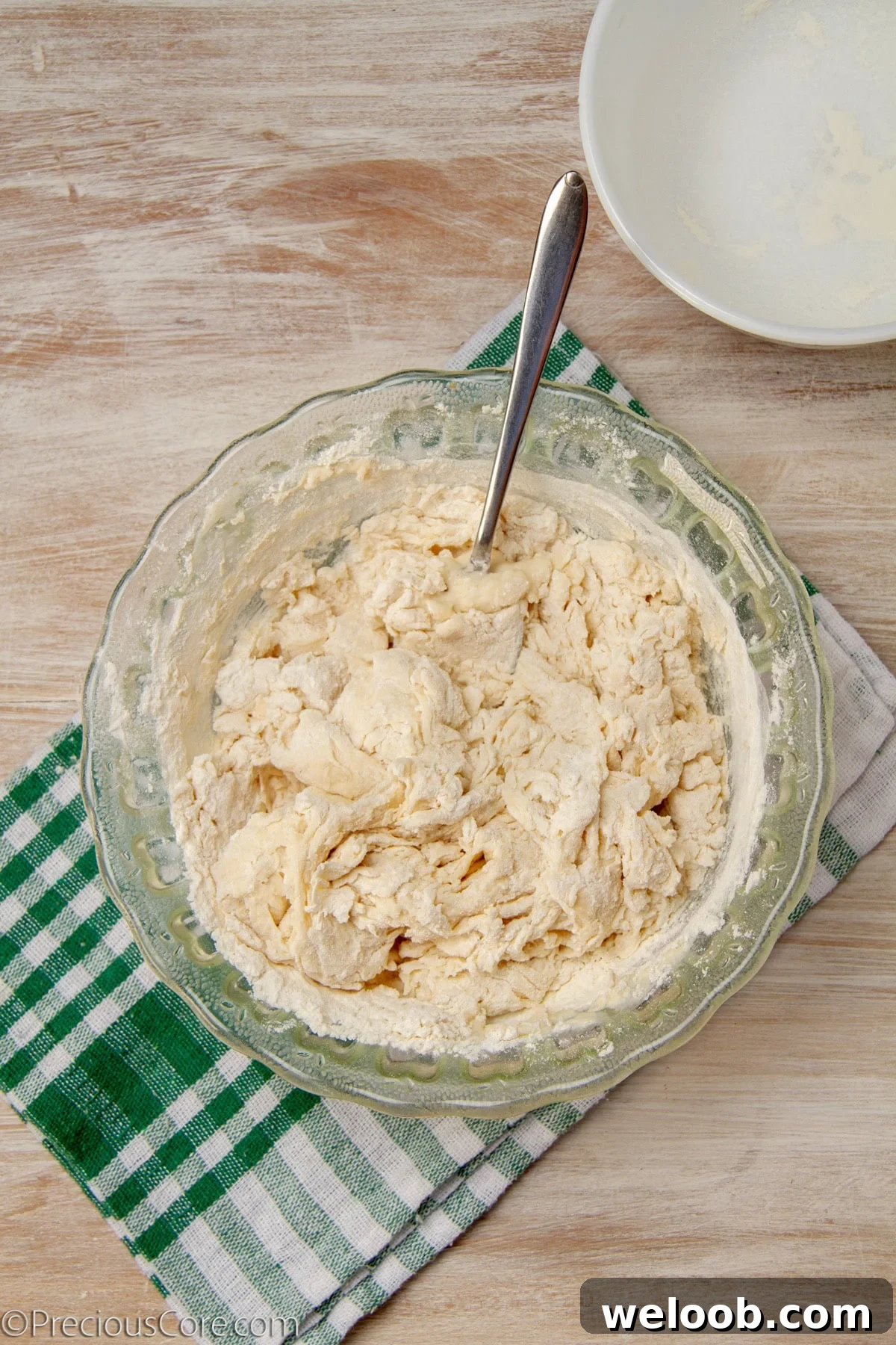 Mixing homemade pizza dough.