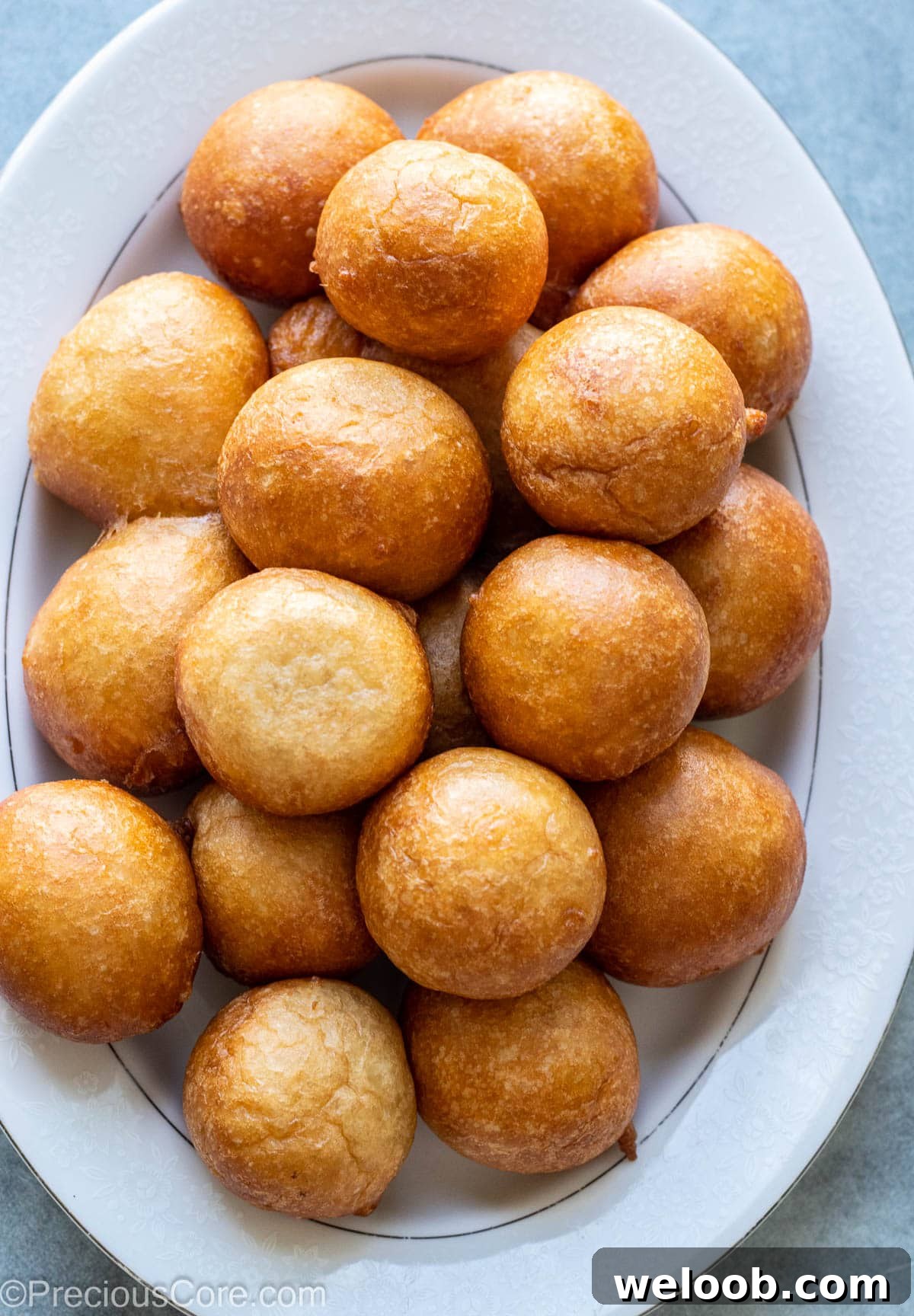 Puff Puff on a white tray.