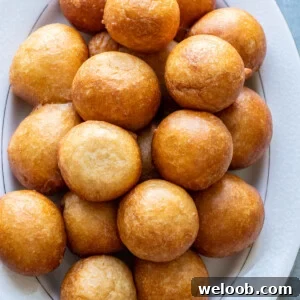 Puff Puff on a white tray.