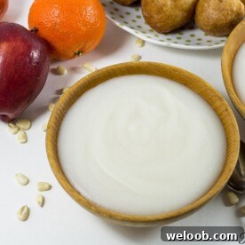 Wooden bowl of pap - corn porridge.