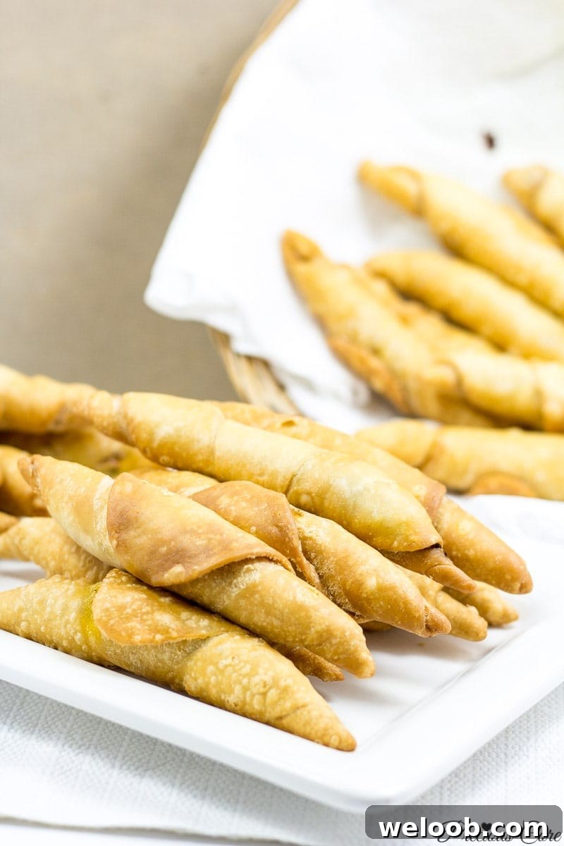 Plate and basket of Cameroonian fish rolls.