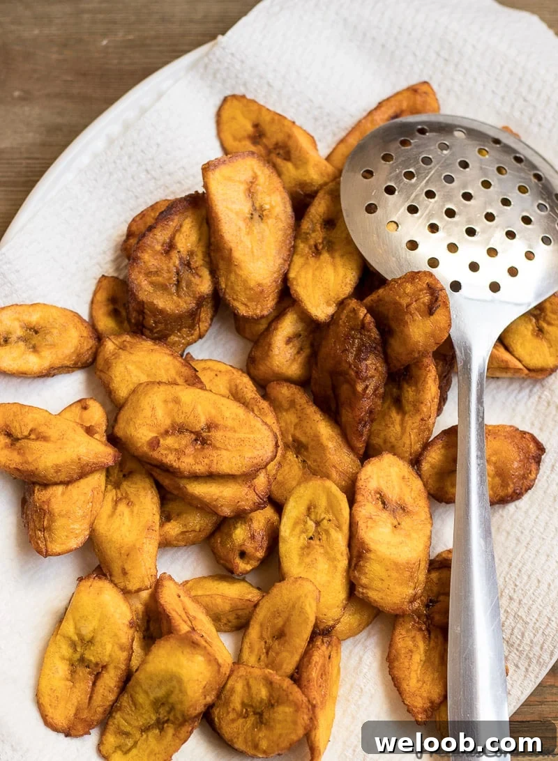 Sweet fried plantains placed on paper towels.