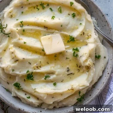 Square image of rosemary garlic mashed potatoes.