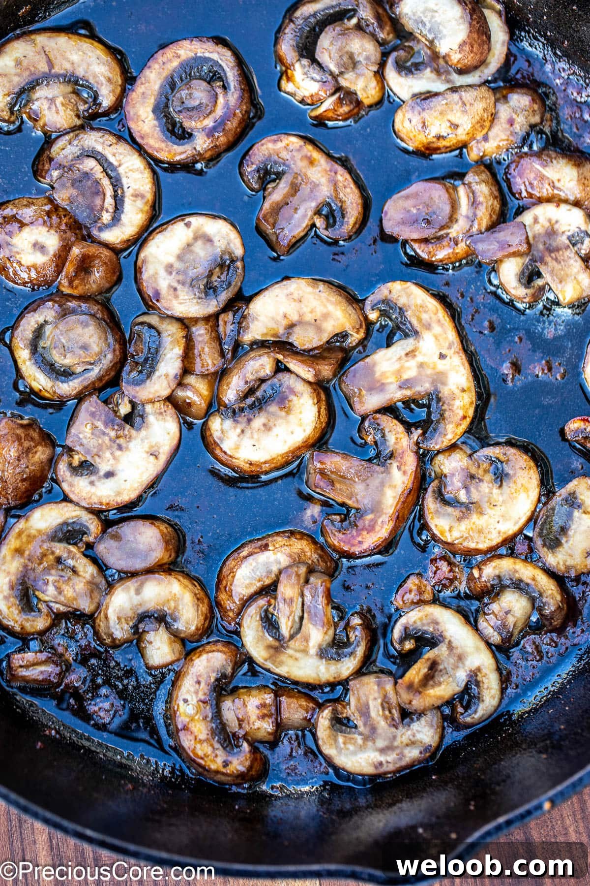 Sautéed mushrooms in a skillet.