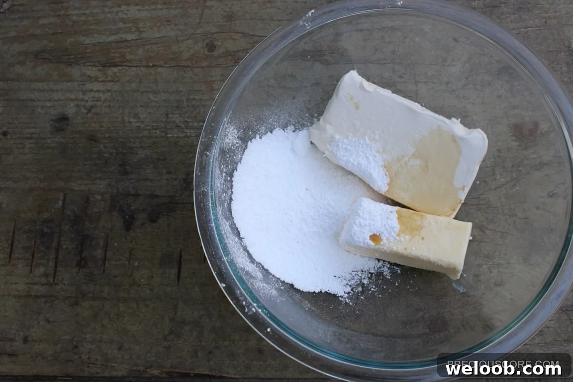 Cream cheese filling ingredients in a mixing bowl.