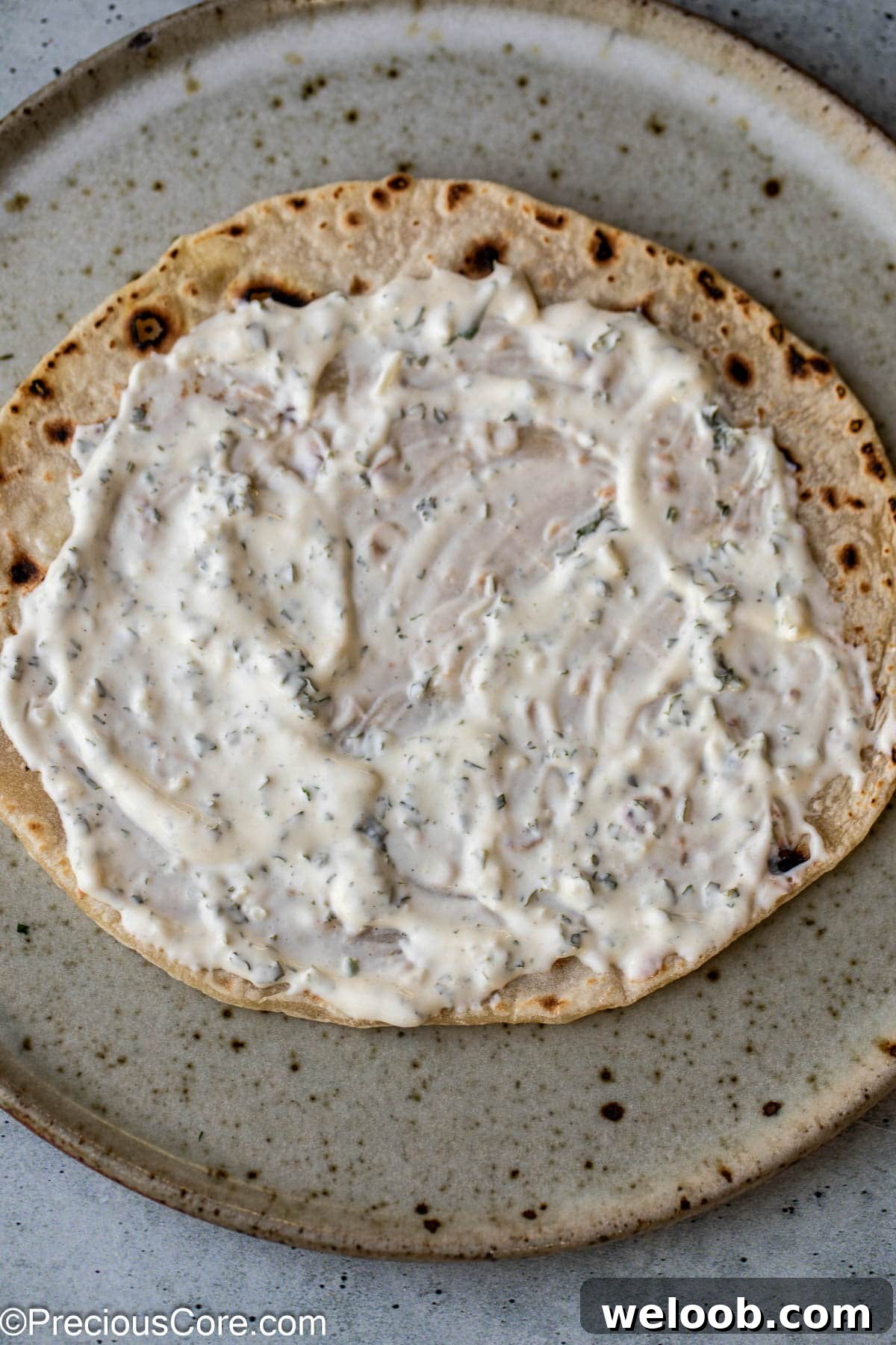 Shawarma sauce on flatbread.