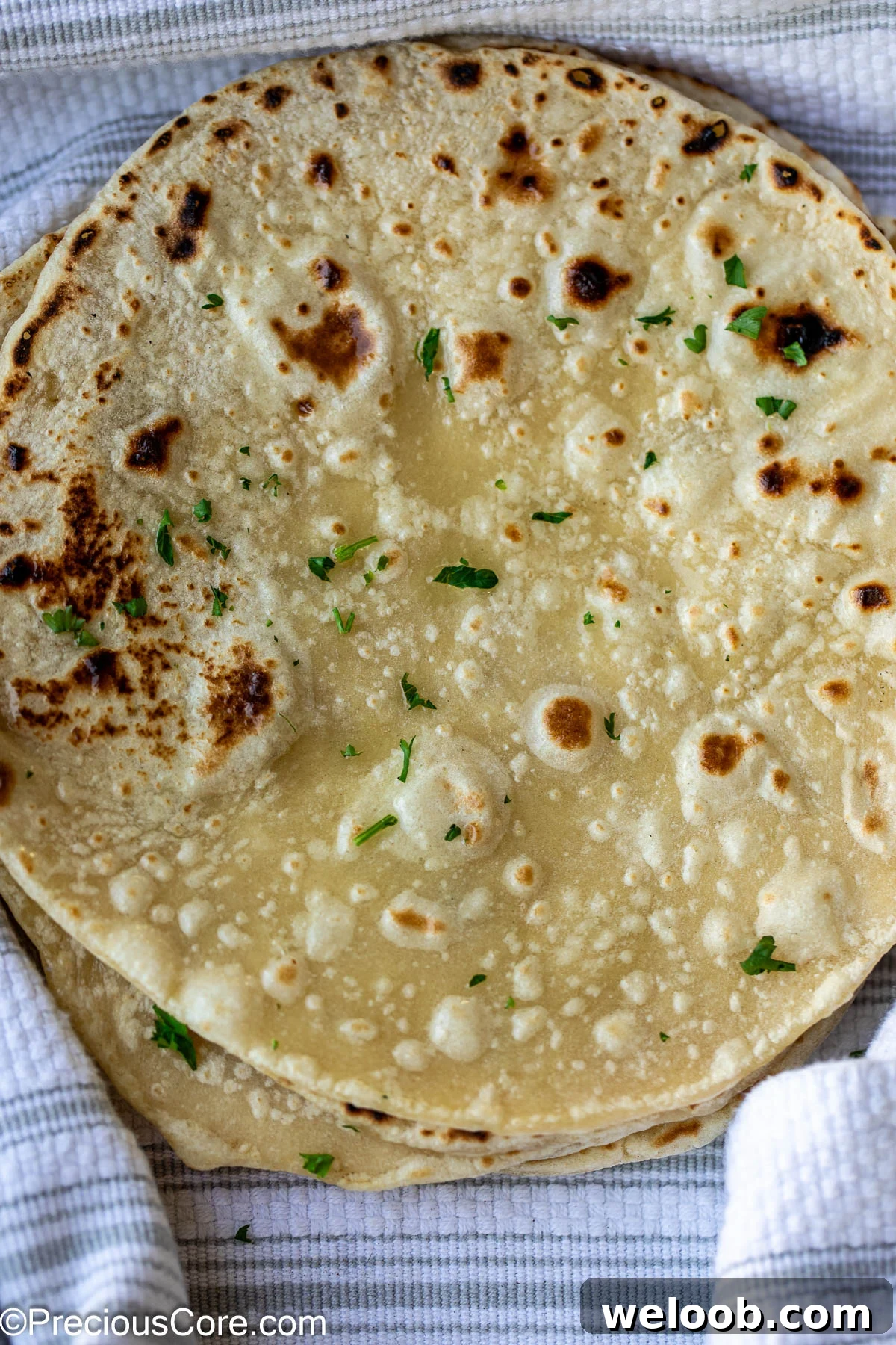 Flatbread topped with minced fresh parsley.