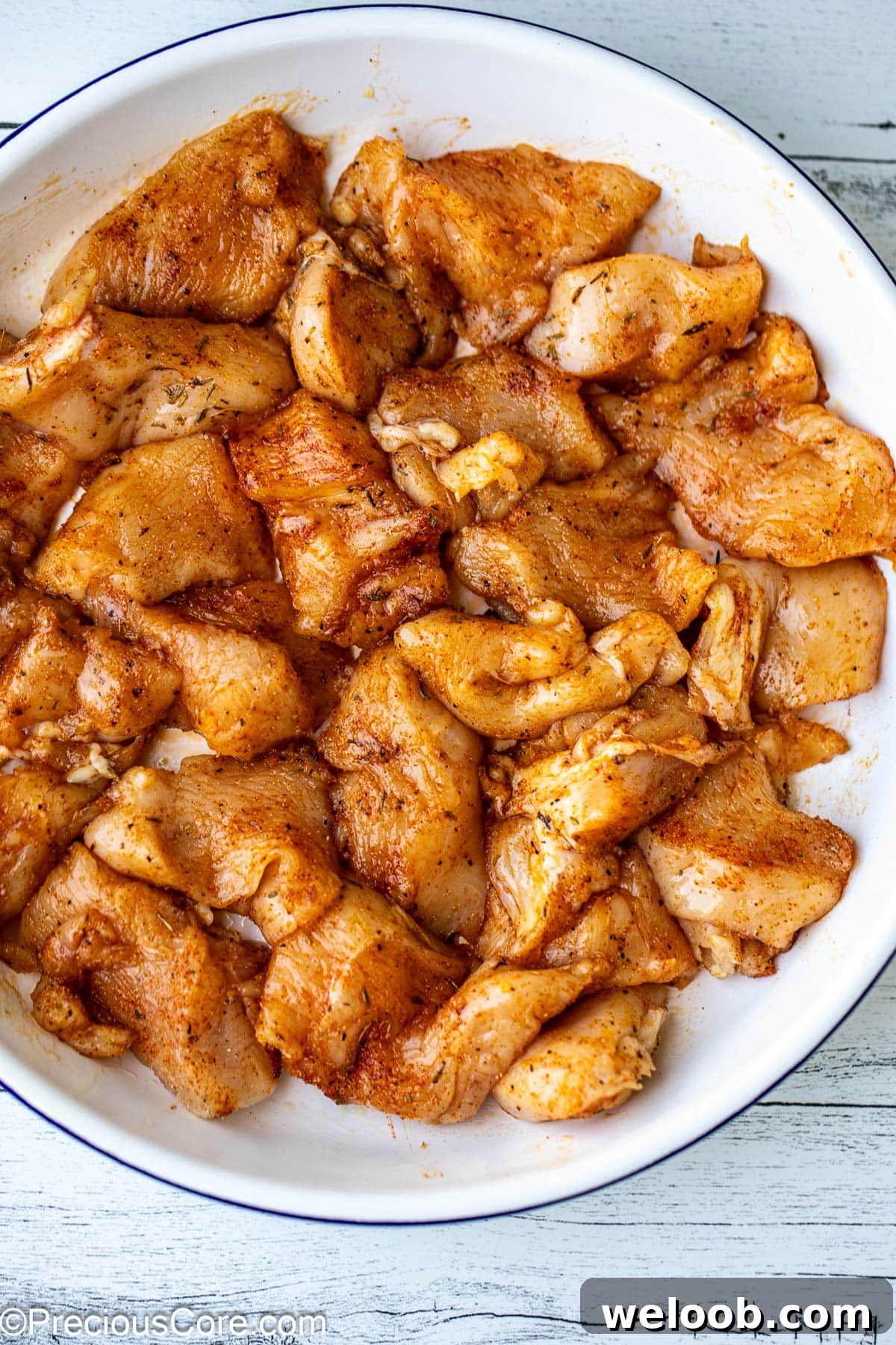 Seasoned boneless skinless chicken pieces.