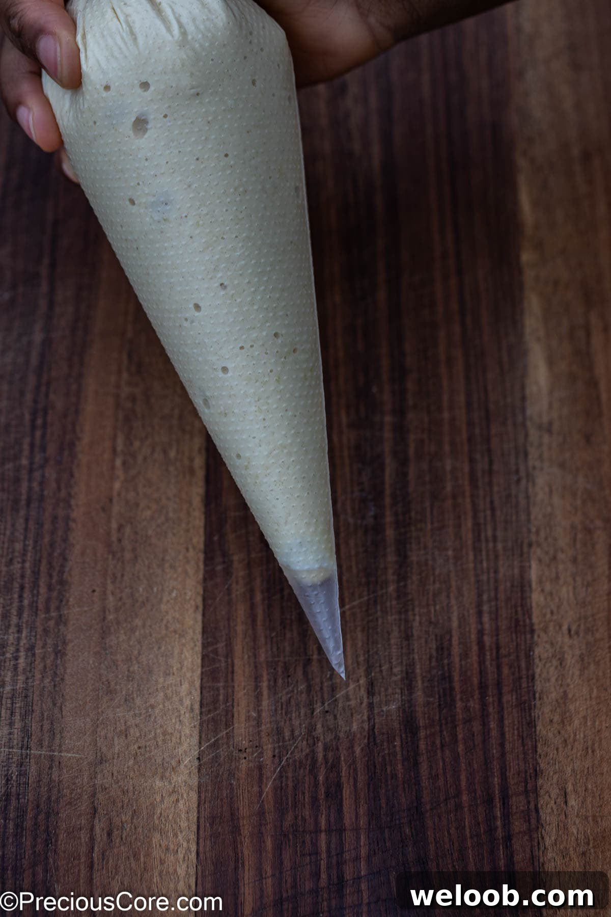 Pancake batter in a piping bag.