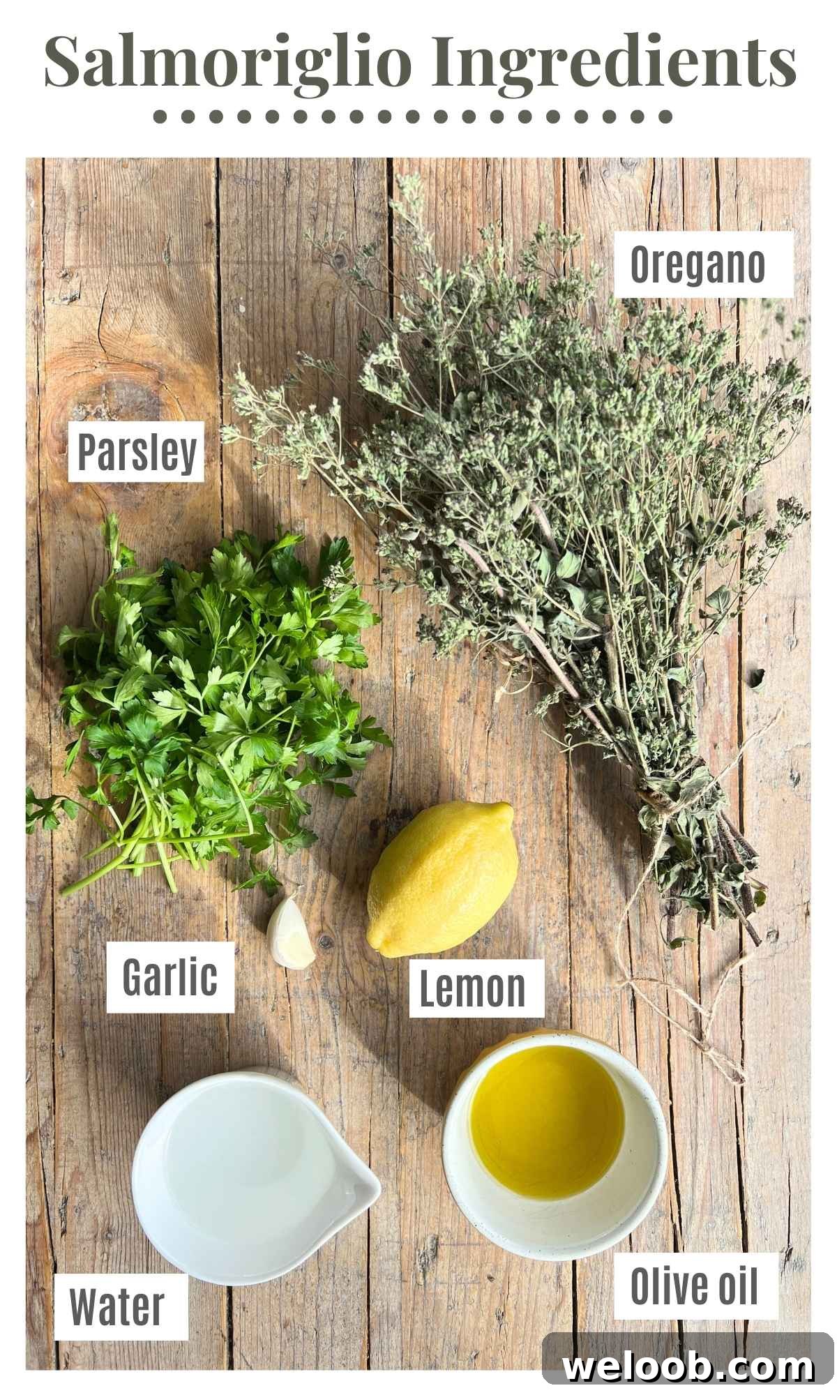 Dried oregano, parsley, olive oil, lemon, garlic, and water laying on a wooden surface.