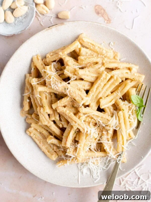 An overhead shot of pasta with pesto alla trapanese