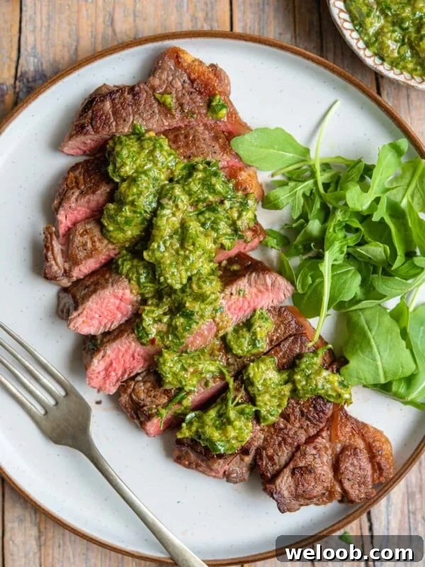 Salsa verde drizzled on top of steak