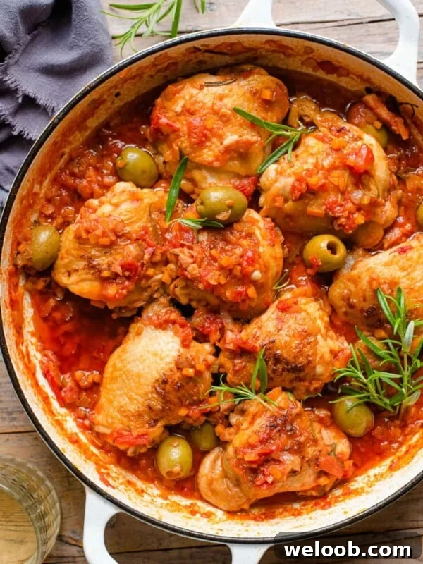 Braised Chicken with Pancetta, White Beans and Fresh Sage 10 An overhead shot of chicken cacciatore in a skillet