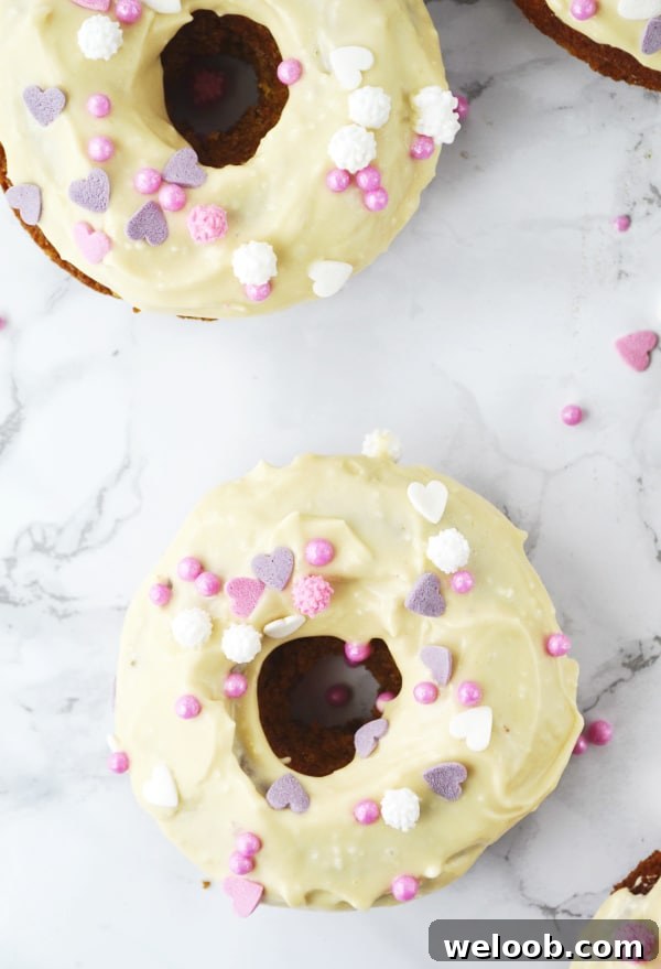 carrot cake doughnuts with maple frosting