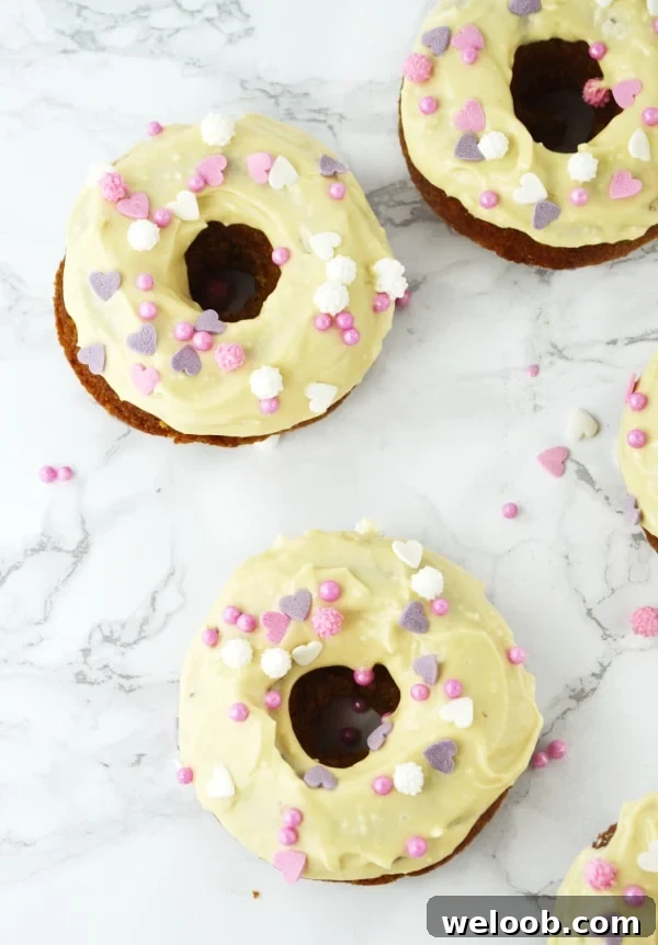 carrot cake doughnuts with maple frosting